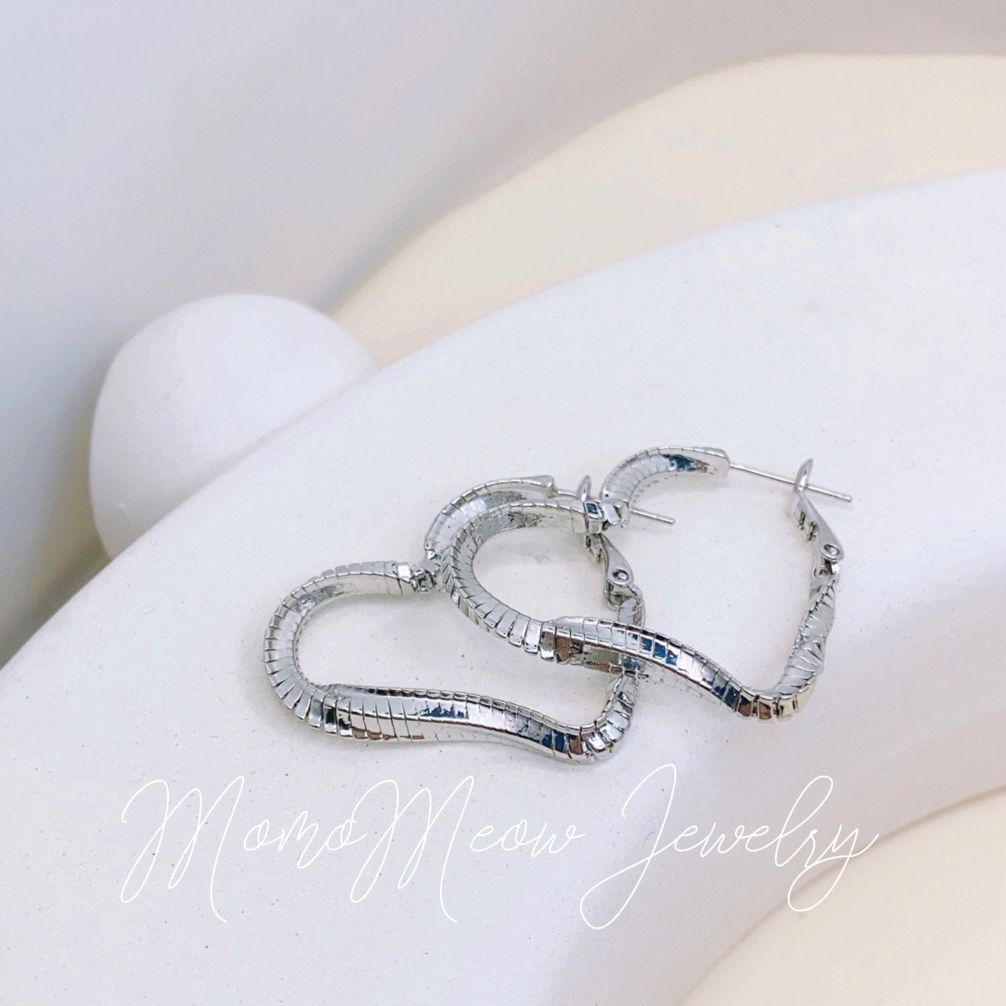 Shimmer heart loop earrings